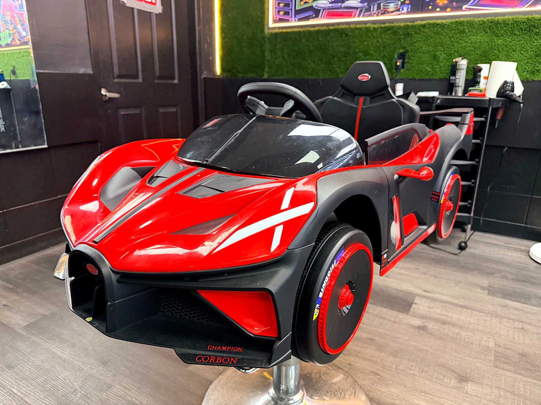 Red ride-on sports car barber chair for kids