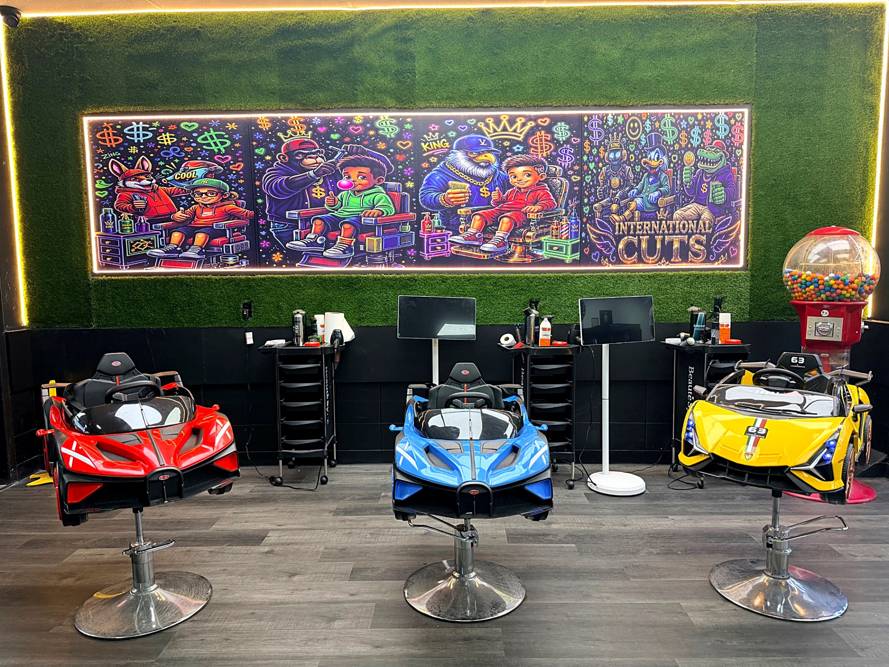 Kids zone with ride-on cars and portable screens