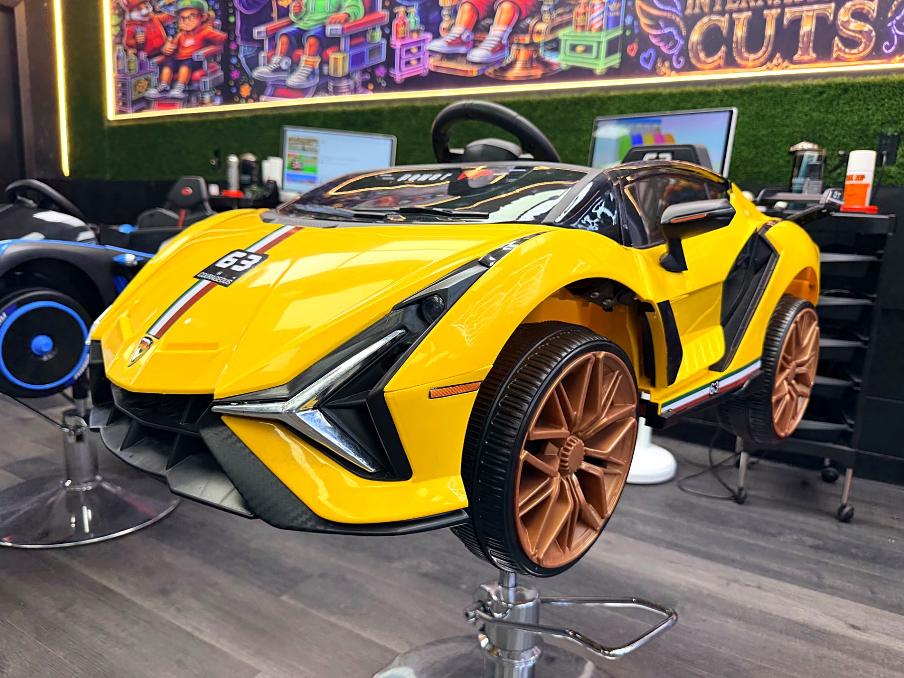 Yellow ride-on sports car barber chair for kids